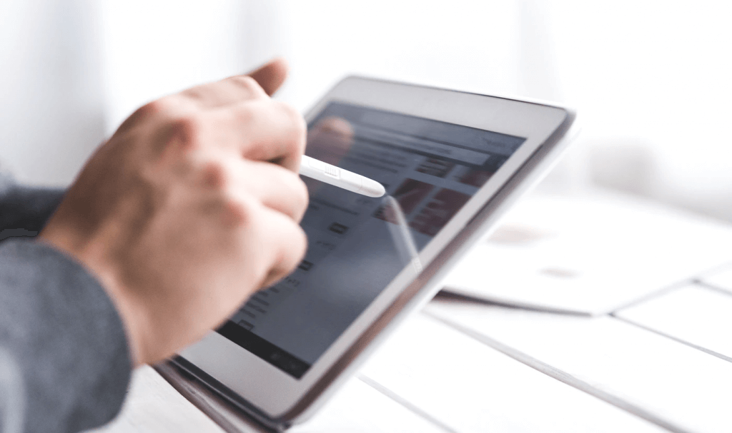 hand writing on digital tablet